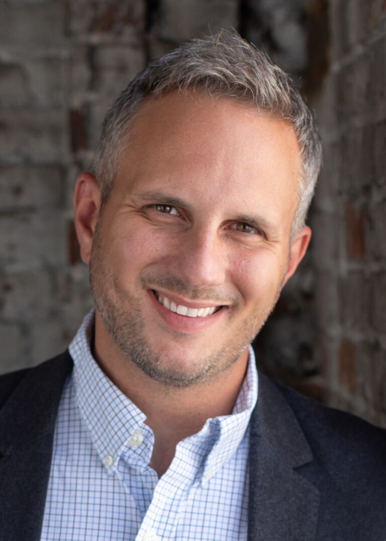 Justin Berry Plain's Paris Team RE/MAX Revolution Kansas City Real Estate